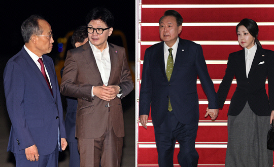 지난 10월11일 성남 서울공항으로 동남아 3국 순방을 마치고 귀국하는 윤석열 대통령과 김건희 여사 부부(오른쪽), 윤 대통령을 미리 마중 나온 국민의힘 한동훈 당대표와 추경호 원내대표(왼쪽).<연합뉴스 사진 갈무리>